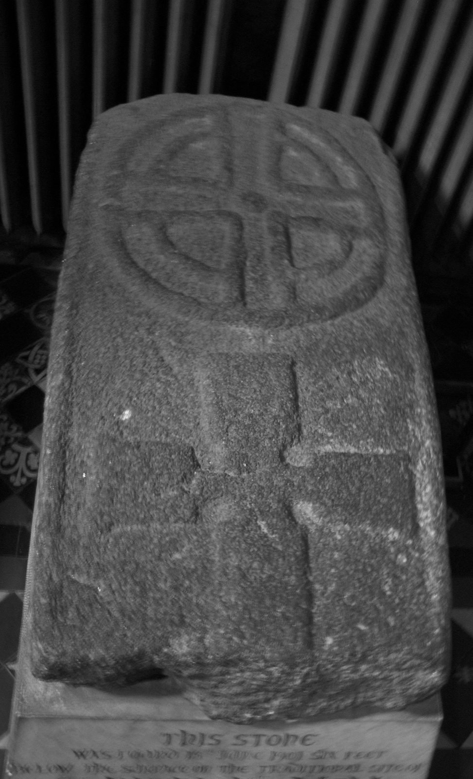 The carved stone found over the old well, now in the cathedral. Photo: Wknight94, Wikimedia Commons, CC BY-SA 3.0.